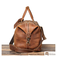 Profil du sac de voyage cuir Routard camel avec bandoulière