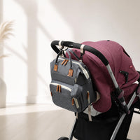Pack Famille : sac à langer Cocon accroché à une poussette
