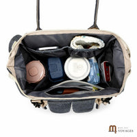 Intérieur organisé du sac à langer Cocon avec nombreux compartiments