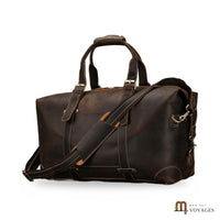Sac de voyage cuir marron foncé avec bandoulière rembourrée