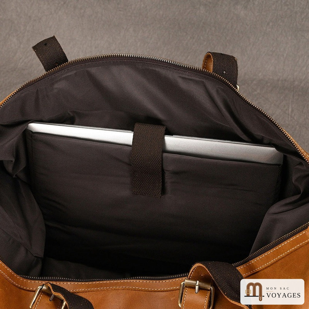 Compartiment ordinateur matelassé du sac de voyage cuir