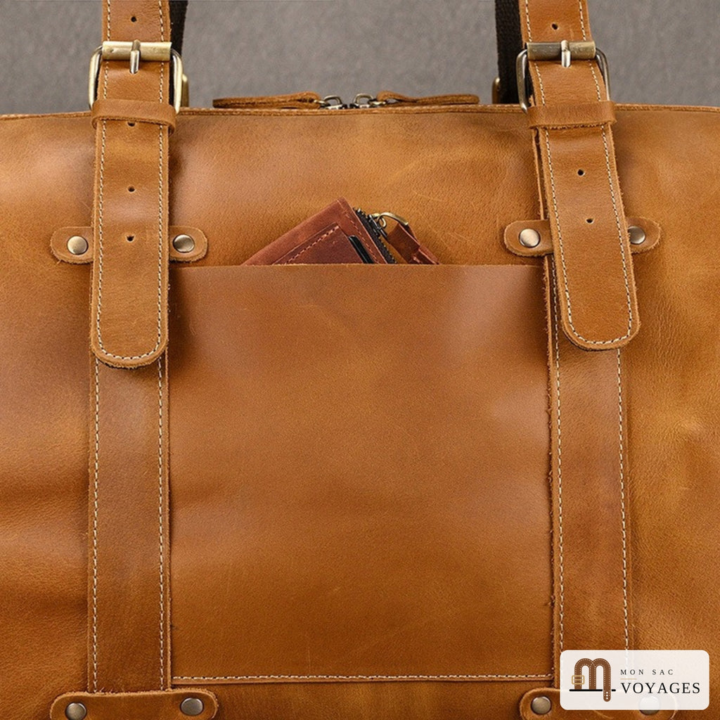Poche plaquée avant du sac week-end cuir