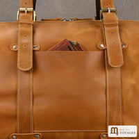 Poche plaquée avant du sac week-end cuir