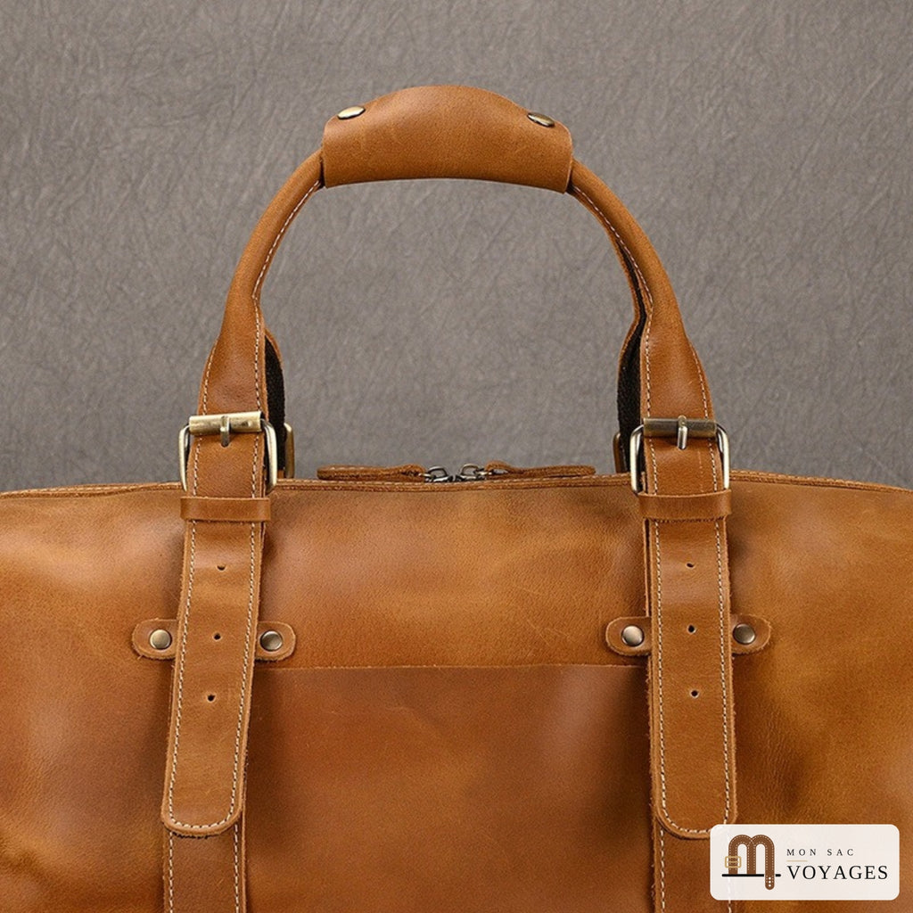 Poignée et boucles en métal du sac en cuir vintage