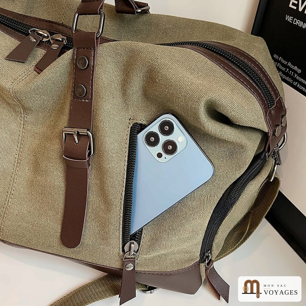 Poche zippée en façade du sac de voyage Bivouac avec un téléphone