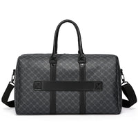 Dos du sac de voyage Dandy avec sa sangle pour poignée de valise