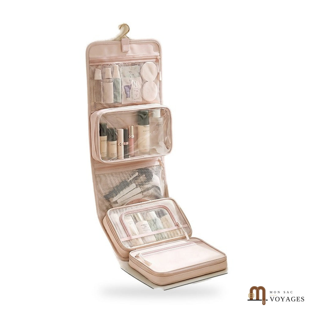 Trousse de toilette suspendue Lagune rose pêche dépliée avec son crochet sur fond blanc
