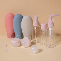 Kit Lido corail, bleu et beige : flacons silicone, pompe, spray, pots et accessoires