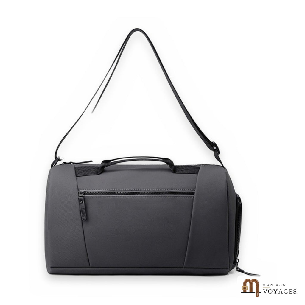 Sac de voyage polochon Zénith gris avec bandoulière réglable, sur fond blanc