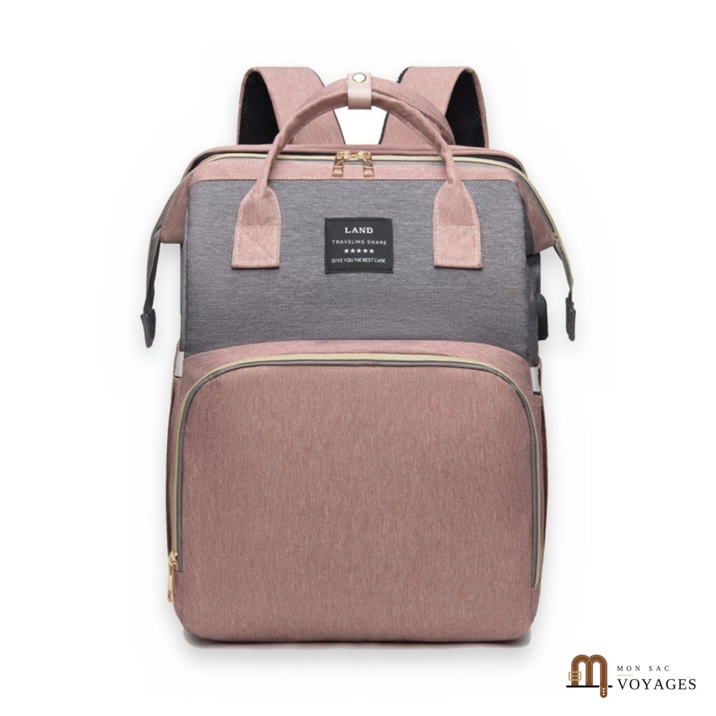 Sac à langer sac à dos Nid rose et gris avec lit bébé pliable, sur fond blanc