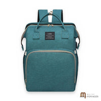 Sac à langer sac à dos Nid vert canard avec lit bébé pliable, sur fond blanc