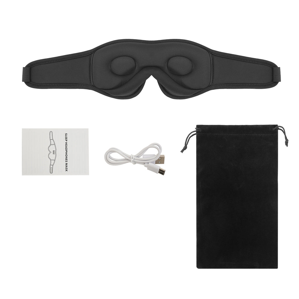 Masque de sommeil Bluetooth Berceuse noir vu de face avec ses coques 3D, notice, câble USB et pochette en velours