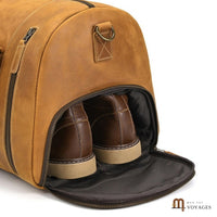 Compartiment chaussures zippé du sac de voyage cuir homme
